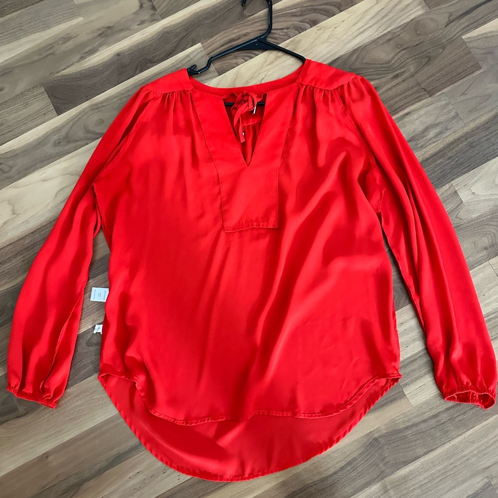 Red flowy blouse. Size M